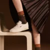Aura-skinnsneakers for kvinner