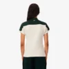 Damemodell, produsert i Frankrike, slim fit, stripet pologenser