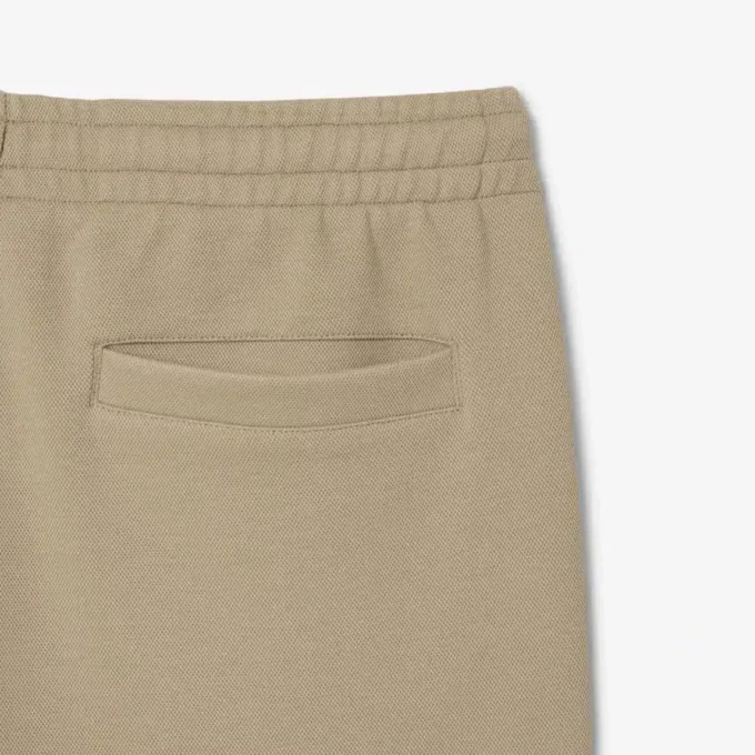 Dobbeltsidig piqué-joggebukse for menn