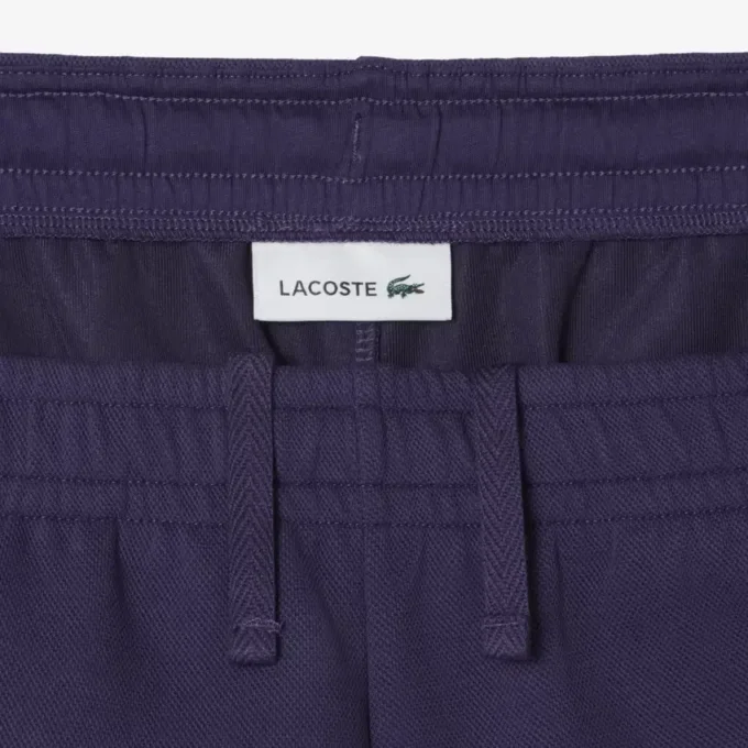 Dobbeltsidige piqué-shorts for kvinner