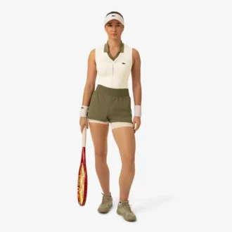 Ermeløs tennis-poloskjorte i stretchstrikk for damer