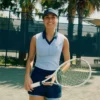 Ermeløs tennis-poloskjorte i stretchstrikk for damer