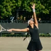 Ermeløs tennis-poloskjorte i stretchstrikk for damer