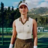 Ermeløs tennis-poloskjorte i stretchstrikk for damer