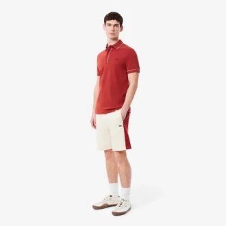 Fargeblokkerte shorts i bomullsfleece for menn