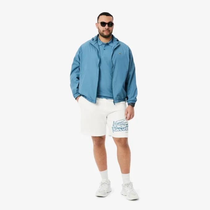 Grafisk printet bomullsfleece-shorts for menn