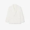 Herreblazer med dobbeltspent knappestolpe og brodert Heritage-merke