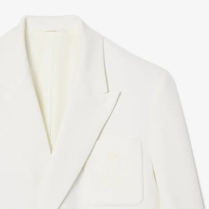 Herreblazer med dobbeltspent knappestolpe og brodert Heritage-merke