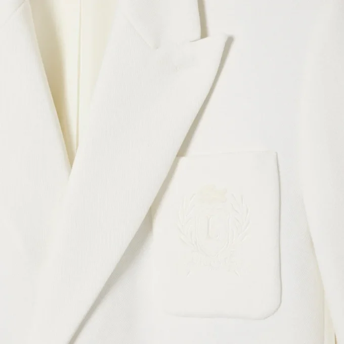Herreblazer med dobbeltspent knappestolpe og brodert Heritage-merke