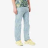 Herrejeans i rett snitt med trykt motiv
