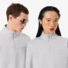 Høyhalset sweatshirt med glidelås og preget mønster