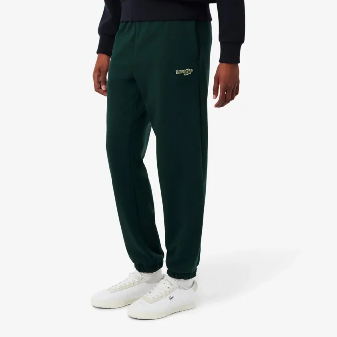 Joggebukse med logo og rett passform for kvinner