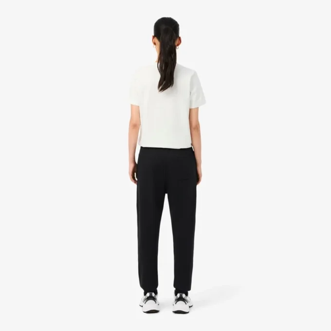 Joggebukse med logo og rett passform for kvinner