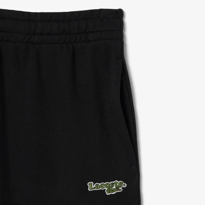 Joggebukse med logo og rett passform for kvinner