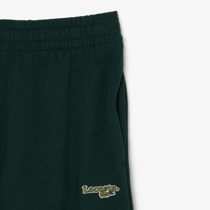 Joggebukse med logo og rett passform for kvinner