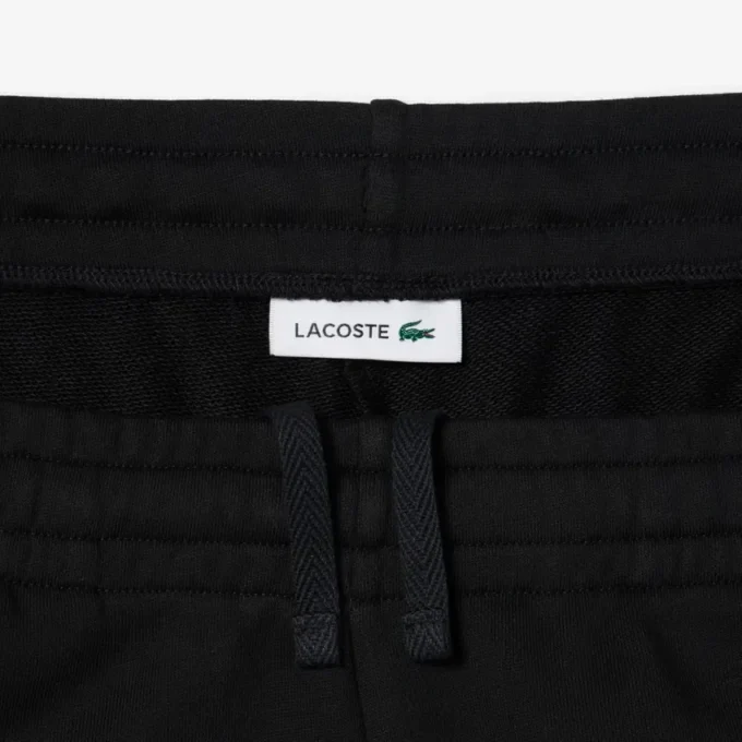 Joggebukse med logo og rett passform for kvinner