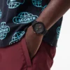 Lacoste.12.12 Chrono-klokke i svart og karneolgull med silikonrem