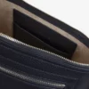 Lacoste Club clutch i kornet skinn
