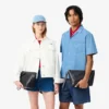 Lacoste Club clutch i kornet skinn