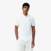 Lacoste Tennis X Novak Djokovic på banen Polo