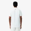 Lacoste Tennis X Novak Djokovic på banen Polo