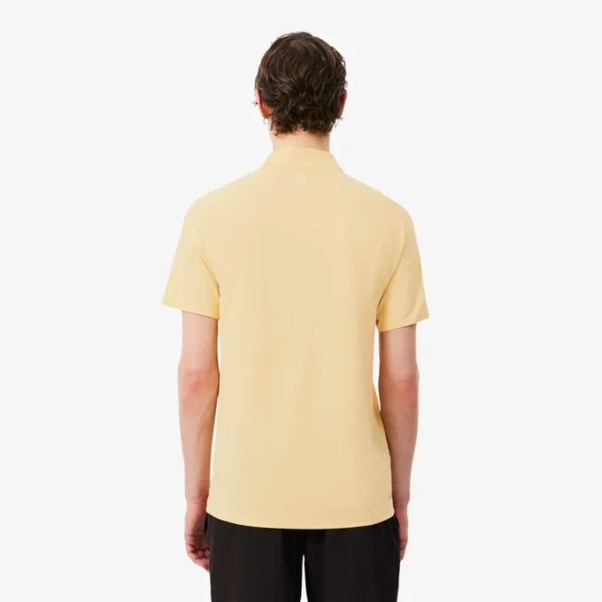 Lacoste Tennis X Novak Djokovic på banen Polo