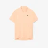 Lacoste Tennis X Novak Djokovic på banen Polo