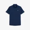 Lacoste Tennis X Novak Djokovic på banen Polo
