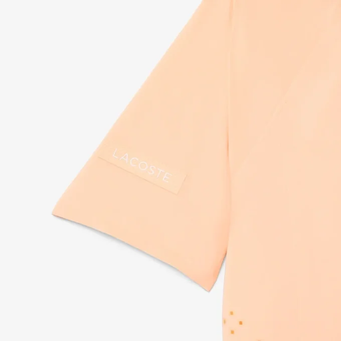 Lacoste Tennis X Novak Djokovic på banen Polo