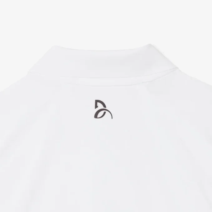 Lacoste Tennis X Novak Djokovic på banen Polo