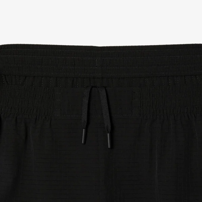 Lette sportshorts i stretch for menn
