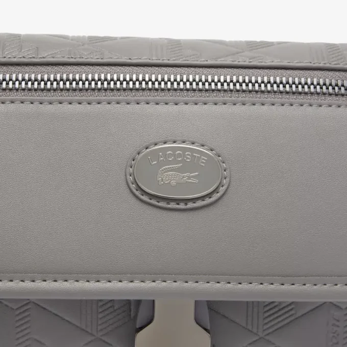 Liten skinnveske med klaff og monogram