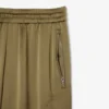 Oversized joggebukse i sateng for kvinner