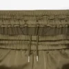 Oversized joggebukse i sateng for kvinner