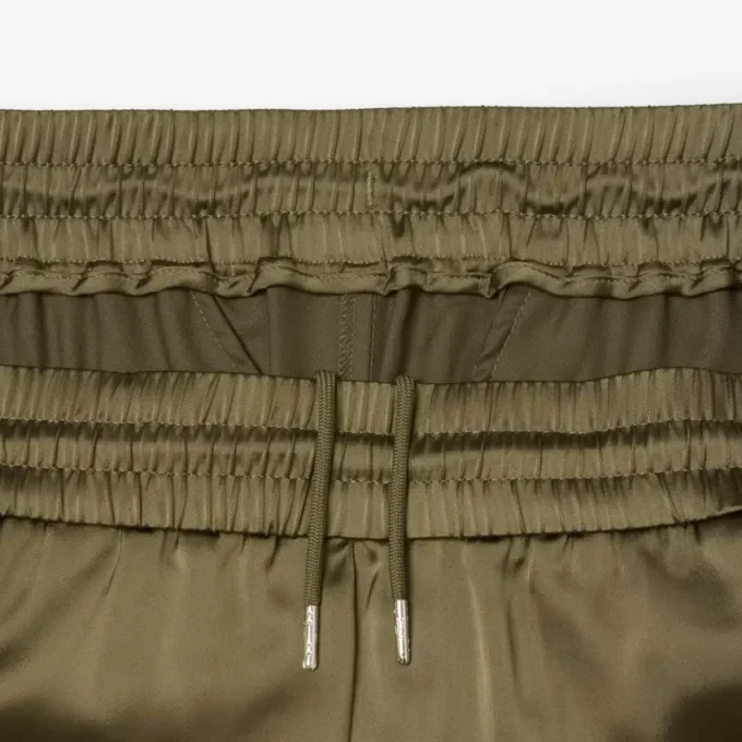 Oversized joggebukse i sateng for kvinner