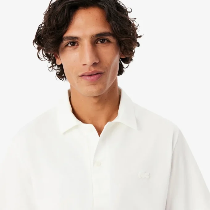 Paris Classic Fit-pologensere med åpen hals og broderi for menn