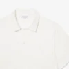 Paris Classic Fit-pologensere med åpen hals og broderi for menn