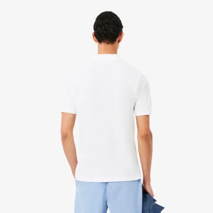 Petit Piqua-polo med klassisk passform og broderidetaljer