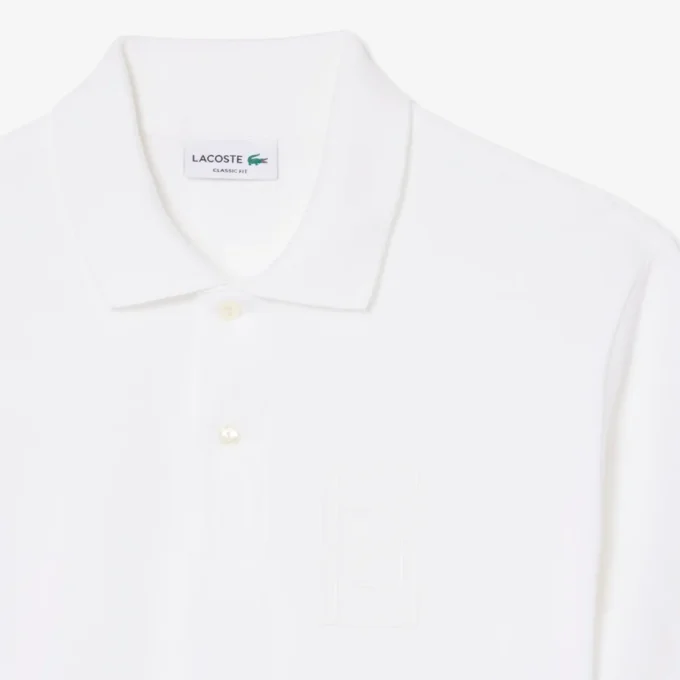 Petit Piqua-polo med klassisk passform og broderidetaljer