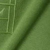 Petit Piqua-polo med klassisk passform og broderidetaljer