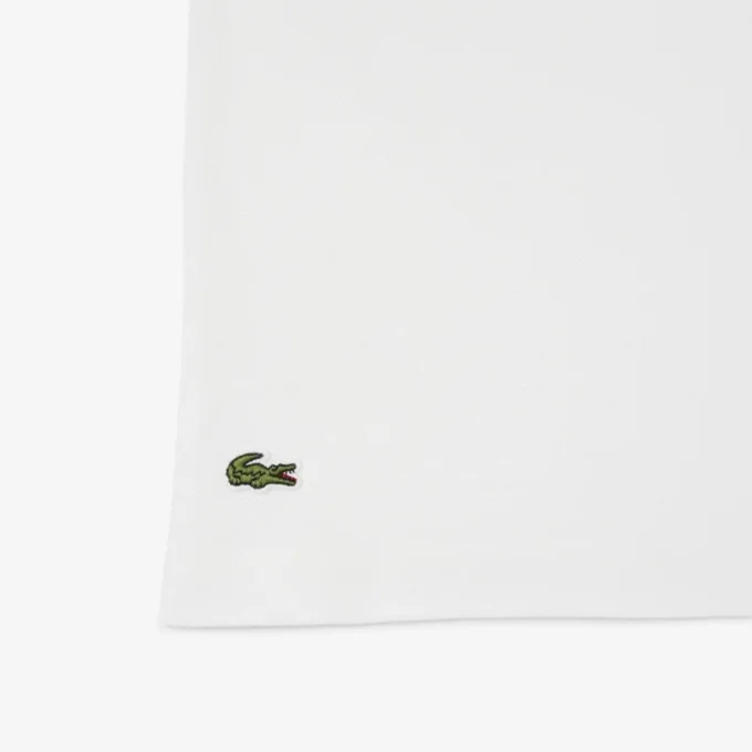 Petit Piqua-pologensere med stripet krage for gutter