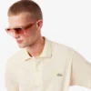 Polo i piqué med broderi og klassisk passform for menn