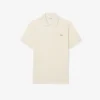 Polo i piqué med broderi og klassisk passform for menn