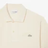 Polo i piqué med broderi og klassisk passform for menn