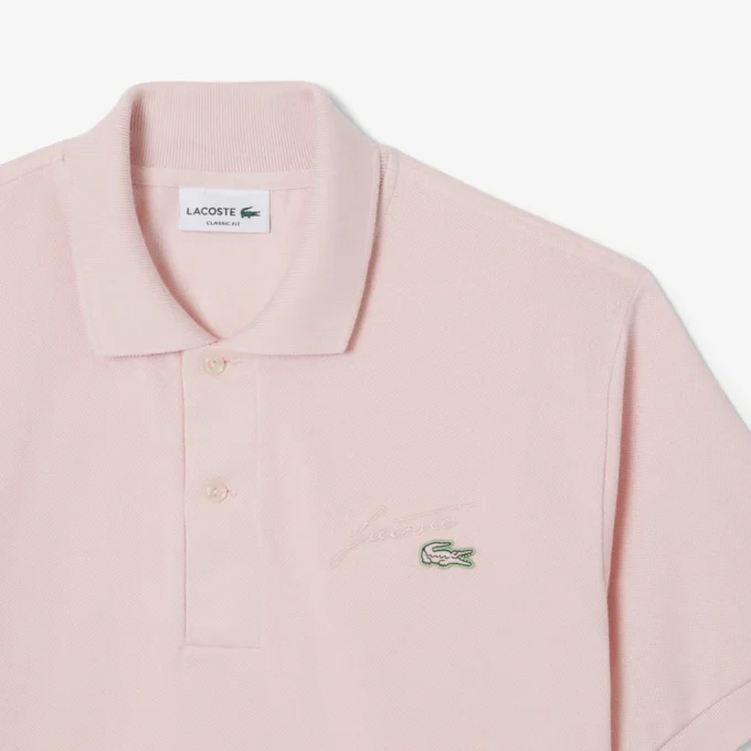 Polo i piqué med broderi og klassisk passform for menn