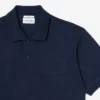 Polo med klassisk passform og preget logo
