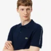 Polo med logo-stripe i normal passform