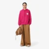 Runway-hettegenser med badge-detalj