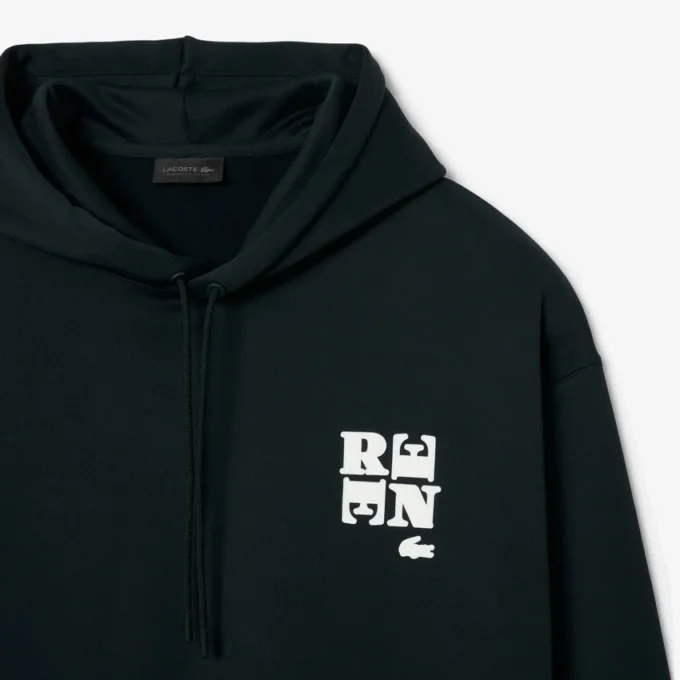 Runway-hettegenser med badge-detalj