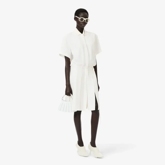 Runway-pologenser med plissering og broderidetaljer